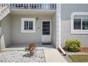 Inviting entrance with a well-lit walkway and fresh landscaping creating a welcoming first impression at 3310 Loveland Blvd # 1102, Punta Gorda, FL 33980