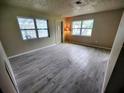 Cozy living room with tile floors, bright natural light, and inviting neutral decor at 190 Danforth Dr, Punta Gorda, FL 33980