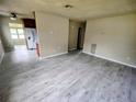 Spacious living room featuring tile floors and neutral wall colors, offering a bright and airy ambiance at 190 Danforth Dr, Punta Gorda, FL 33980