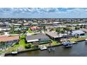 Waterfront homes with boat docks, pools, and well-kept yards in a vibrant coastal community at 505 Via Cintia, Punta Gorda, FL 33950
