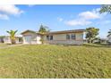 Lovely one-story home boasting an attached garage and a spacious, well-manicured front lawn at 8172 Trionfo Ave, North Port, FL 34287