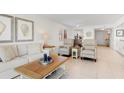 Bright living room with modern furnishings and serene interior design at 1345 Mediterranean Dr # A105, Punta Gorda, FL 33950