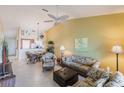 Inviting living room with neutral walls, ceiling fan and coordinated furniture at 4000 Bal Harbor Blvd # 124, Punta Gorda, FL 33950