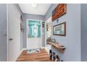 Inviting home entryway with wood floors and decorative accents at 20016 Sancraft Ave, Port Charlotte, FL 33954
