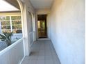Inviting entrance with tiled flooring and decorative archways leading into the home at 296 Milford St, Port Charlotte, FL 33953