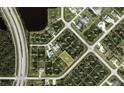 Aerial view of the property's location within a serene neighborhood close to Winchester Blvd at 112 Cougar Way, Rotonda West, FL 33947