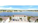 Enjoy waterfront living in this community featuring serene lake views and lush landscaping at 26290 Rampart Blvd # D, Punta Gorda, FL 33983