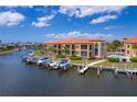 Waterfront condos featuring boat slips and a community pool for residents at 3334 Purple Martin Dr # 214, Punta Gorda, FL 33950