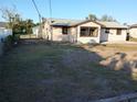 View of backyard with chain link fence at 7321 Bolten Ln, Port Charlotte, FL 33981