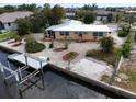 Charming single-story home with a private dock and waterfront access to a canal at 187 Beeney Se Rd, Port Charlotte, FL 33952
