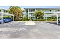 Well maintained condo building with assigned parking near the beautifully landscaped entrance at 2020 Willow Hammock Cir # 302, Punta Gorda, FL 33983