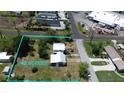 Aerial view outlining the property boundaries of a charming lot with .42 acres at 899 S Broadway, Englewood, FL 34223