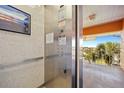 Elevator leading to units with outdoor balcony and palm tree views at 1326 Wesley Dr # 132, Punta Gorda, FL 33950
