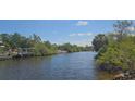 Picturesque water view, perfect for relaxing and enjoying the tranquility of the waterfront at 17356 Gulfspray Cir, Port Charlotte, FL 33948