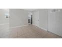 Bright entryway featuring tile floors and easy access to the kitchen at 3515 Vasco St, Punta Gorda, FL 33950