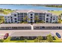 Beautiful aerial view of the condo complex with well-maintained landscaping and convenient parking at 43050 Greenway Blvd # 645, Punta Gorda, FL 33982