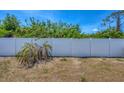 An image of a white fence in the backyard of a property at 118 Boxwood Ln, Rotonda West, FL 33947
