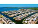 Island community features waterfront homes and canal access to the open bay at 148 Peckham St Se, Port Charlotte, FL 33952