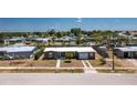 Expansive aerial view of a cozy home nestled in a tranquil neighborhood with canals at 159 Godfrey Ne Ave, Port Charlotte, FL 33952