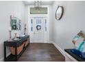 Inviting foyer with elegant decor, a stylish console table, and tasteful accents at 25273 Paraguay St, Punta Gorda, FL 33983