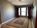 Comfortable room with a patterned rug and curtains, creating a cozy ambiance at 16072 Galiano Ct, Punta Gorda, FL 33955