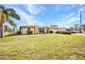 A single-story home shows a well-maintained lawn and landscaping at 3663 Sterling Rd, Venice, FL 34293