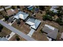 Birds eye view of property including roof and surrounding neighborhood at 543 Mayview Nw Ave, Port Charlotte, FL 33952