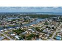 Aerial view of neighborhood with waterfront access at 543 Mayview Nw Ave, Port Charlotte, FL 33952