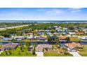 Scenic aerial view of waterfront homes along canals with quick access to the bay at 2911 Riverside Dr, Punta Gorda, FL 33950