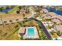 Aerial shot of private pool, pool house, and nice landscaping at 3800 Bal Harbor Blvd # 415, Punta Gorda, FL 33950