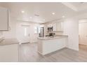 Bright and airy kitchen with modern appliances and granite countertops at 27444 Corinthian Dr, Punta Gorda, FL 33955
