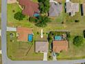 Aerial shot of a single-Gathering home with a lawn and easy access to nearby neighborhood at 27038 San Jorge Dr, Punta Gorda, FL 33983