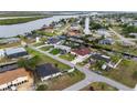 Aerial view of waterfront homes with canals and lush landscaping in a residential community at 3301 Santa Barbara Dr, Punta Gorda, FL 33983