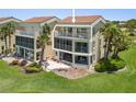 Spacious condo with screened lanais overlooking manicured lawn and tropical landscape in a beach community at 876 Golden Beach Blvd # 876, Venice, FL 34285