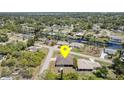 Aerial view of the property, showcasing its location and proximity to waterways in the neighborhood at 2707 Auburn Blvd, Port Charlotte, FL 33948