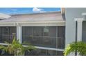 The screened lanai has views of the community and a seating area at 14267 Heritage Landing Blvd # 1223, Punta Gorda, FL 33955