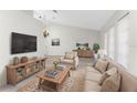 Inviting living room with neutral tones, comfortable seating, and stylish decor at 18111 Lake Worth Blvd, Port Charlotte, FL 33948