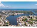 Stunning aerial view shows the property's waterfront location with nearby river, canals, and ocean access at 211 E Tarpon Nw Blvd, Port Charlotte, FL 33952