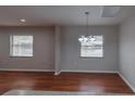 Cozy dining area with stylish light fixture and neutral color palette, ideal for gatherings at 406 Merlin Ct, Brandon, FL 33510