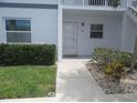 Exterior shot of the front entrance of the building featuring the door with the number 511 at 26430 Rampart Blvd # 511, Punta Gorda, FL 33983