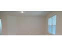 Bedroom featuring neutral walls, a window, and electrical outlets at 4830 Cazes Ave, North Port, FL 34287