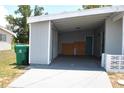 View of the carport with ample space for parking and storage at 21275 Austin Ave, Port Charlotte, FL 33952
