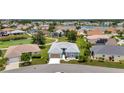 Aerial view of a well-maintained single-story home in a peaceful neighborhood at 24312 Westgate Blvd, Port Charlotte, FL 33980