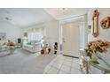 Inviting entryway featuring tiled floor and bright natural light at 4055 Alwick Ln, North Port, FL 34287