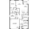 Detailed floor plan showcasing the layout with four bedrooms, two baths, and open kitchen/dining/living area at 18147 Regan Ave, Port Charlotte, FL 33948