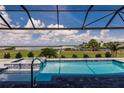 Relaxing pool and spa area showcasing the beautiful water views, perfect for outdoor enjoyment at 5061 Collingswood Blvd, Port Charlotte, FL 33948