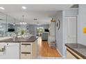 Modern kitchen featuring stainless steel appliances, ample counter space, and seamless open-concept layout at 25275 Rampart Blvd # 1504, Punta Gorda, FL 33983