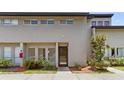 Charming two-story townhome with a well-manicured lawn and beautiful landscaping at 4346 Rayfield Dr # 4346, Sarasota, FL 34243