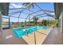 Enjoy the outdoors with a private screened-in pool overlooking the water at 632 Brindisi Ct, Punta Gorda, FL 33950