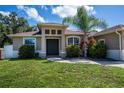 Welcoming front entrance with a stylish double door and decorative stone accents at 4294 Wooley Ave, North Port, FL 34287